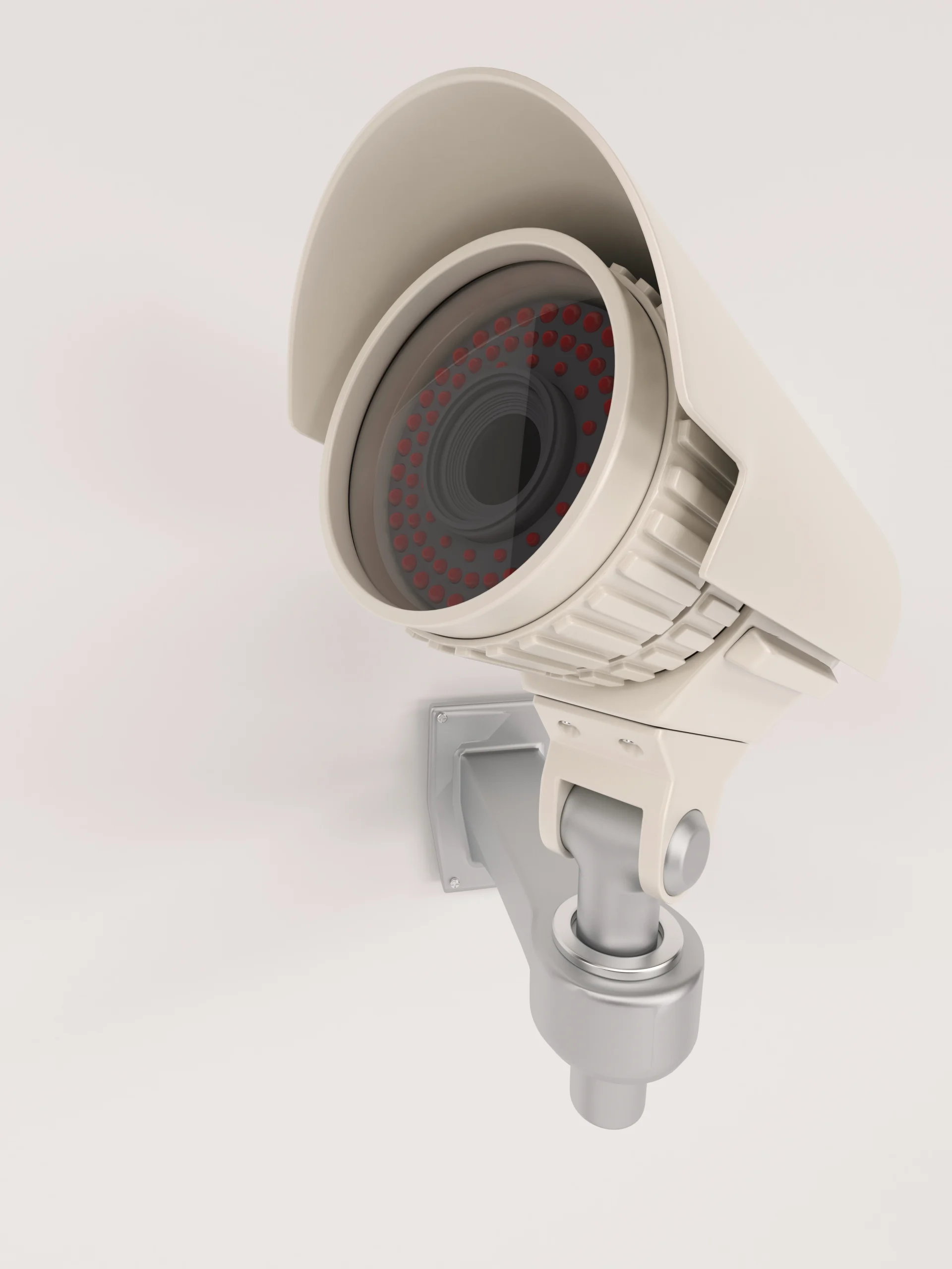 Cámara de seguridad moderna instalada en una pared blanca, compatible con Alexa y Google Home